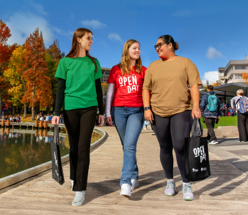 students-walking-past-lake-openday-mobile