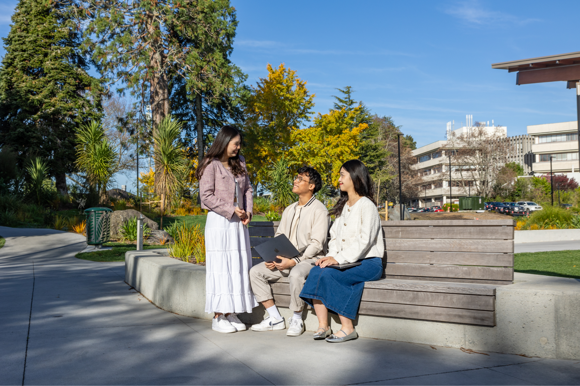 group-of-students-sitting-outside